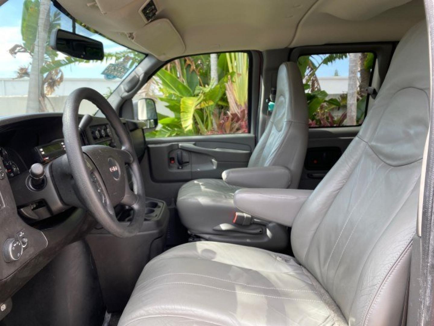 2009 Sport Red Metallic /Medium Pewter GMC Savana Passenger LOW MILES 53,014 1 OWNER 8 Passenger (1GKFG154891) with an 5.3L Vortec 1000 V8 SFI Engine engine, Automatic transmission, located at 4701 North Dixie Hwy, Pompano Beach, FL, 33064, (954) 422-2889, 26.240938, -80.123474 - OUR WEBPAGE FLORIDACARS1.COM HAS OVER 100 PHOTOS AND FREE CARFAX LINK 2009 GMC Savana LS 1500 1 OWNER 8 PASSENGER Van 5.3L V8 F OHV 16V Flex Fuel 16 MPG Rear Wheel Drive Features ABS Brakes Air Conditioning AM/FM Stereo Automatic Transmission CD Audio Cloth Seats Cruise Control Overhead Airbags Powe- Photo#42