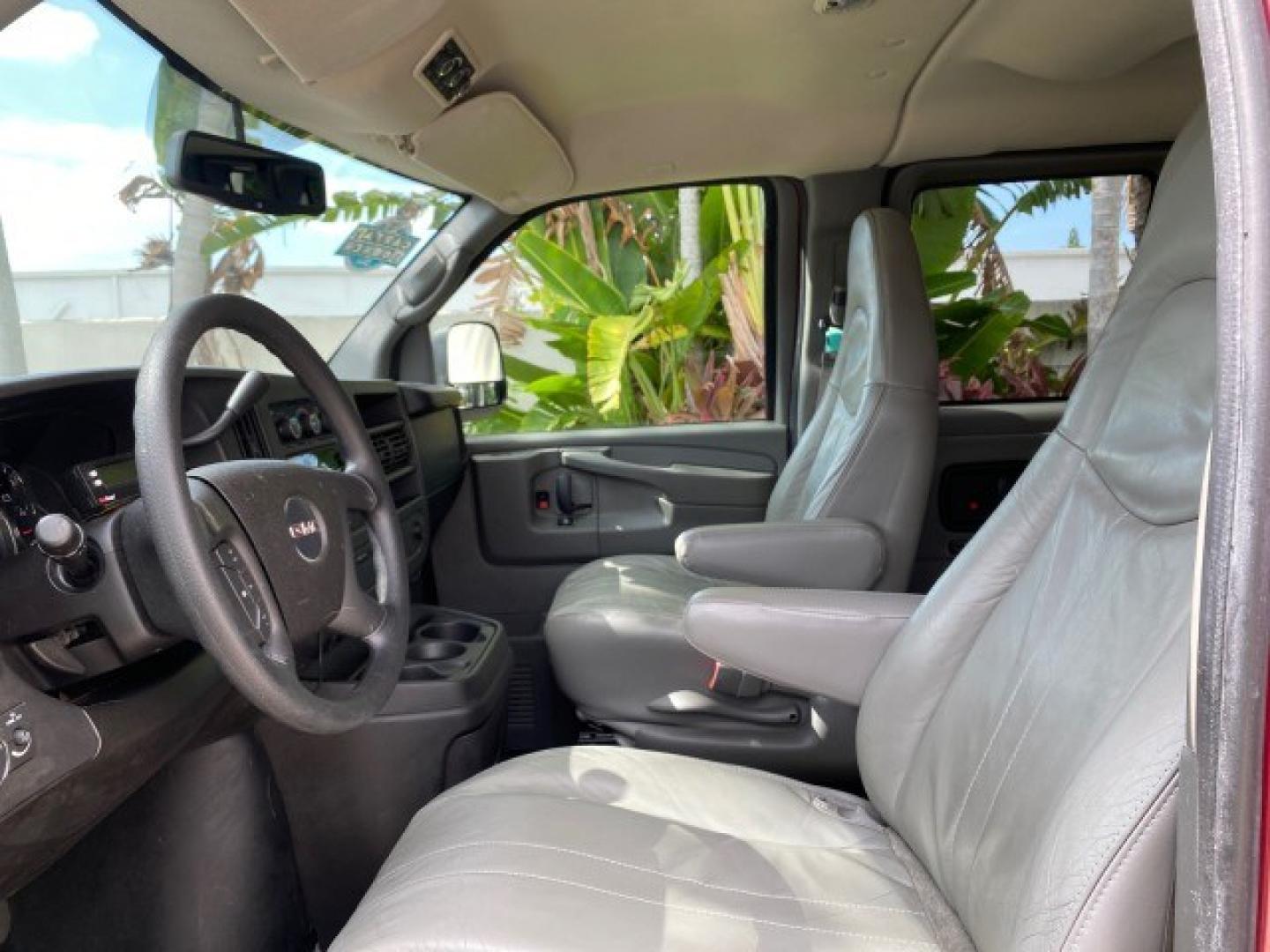 2009 Sport Red Metallic /Medium Pewter GMC Savana Passenger LOW MILES 53,014 1 OWNER 8 Passenger (1GKFG154891) with an 5.3L Vortec 1000 V8 SFI Engine engine, Automatic transmission, located at 4701 North Dixie Hwy, Pompano Beach, FL, 33064, (954) 422-2889, 26.240938, -80.123474 - OUR WEBPAGE FLORIDACARS1.COM HAS OVER 100 PHOTOS AND FREE CARFAX LINK 2009 GMC Savana LS 1500 1 OWNER 8 PASSENGER Van 5.3L V8 F OHV 16V Flex Fuel 16 MPG Rear Wheel Drive Features ABS Brakes Air Conditioning AM/FM Stereo Automatic Transmission CD Audio Cloth Seats Cruise Control Overhead Airbags Powe- Photo#43