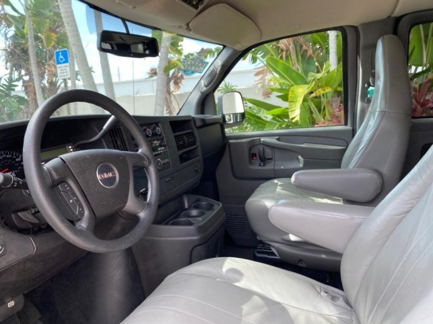 2009 Sport Red Metallic /Medium Pewter GMC Savana Passenger LOW MILES 53,014 1 OWNER 8 Passenger (1GKFG154891) with an 5.3L Vortec 1000 V8 SFI Engine engine, Automatic transmission, located at 4701 North Dixie Hwy, Pompano Beach, FL, 33064, (954) 422-2889, 26.240938, -80.123474 - OUR WEBPAGE FLORIDACARS1.COM HAS OVER 100 PHOTOS AND FREE CARFAX LINK 2009 GMC Savana LS 1500 1 OWNER 8 PASSENGER Van 5.3L V8 F OHV 16V Flex Fuel 16 MPG Rear Wheel Drive Features ABS Brakes Air Conditioning AM/FM Stereo Automatic Transmission CD Audio Cloth Seats Cruise Control Overhead Airbags Powe- Photo#44