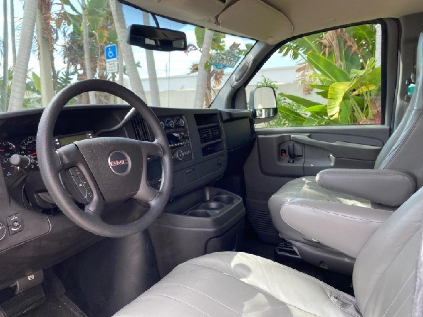2009 Sport Red Metallic /Medium Pewter GMC Savana Passenger LOW MILES 53,014 1 OWNER 8 Passenger (1GKFG154891) with an 5.3L Vortec 1000 V8 SFI Engine engine, Automatic transmission, located at 4701 North Dixie Hwy, Pompano Beach, FL, 33064, (954) 422-2889, 26.240938, -80.123474 - OUR WEBPAGE FLORIDACARS1.COM HAS OVER 100 PHOTOS AND FREE CARFAX LINK 2009 GMC Savana LS 1500 1 OWNER 8 PASSENGER Van 5.3L V8 F OHV 16V Flex Fuel 16 MPG Rear Wheel Drive Features ABS Brakes Air Conditioning AM/FM Stereo Automatic Transmission CD Audio Cloth Seats Cruise Control Overhead Airbags Powe- Photo#45
