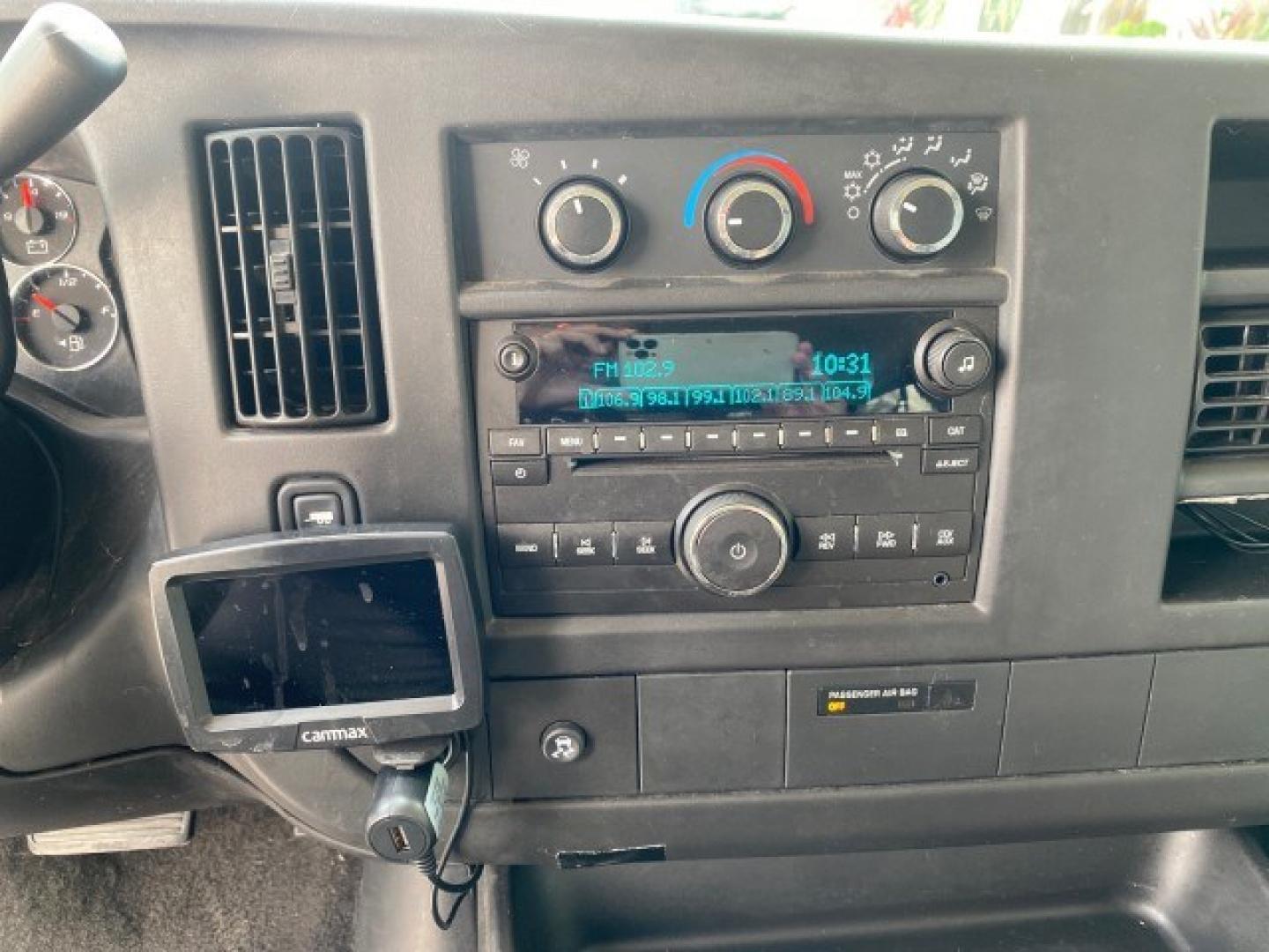 2009 Sport Red Metallic /Medium Pewter GMC Savana Passenger LOW MILES 53,014 1 OWNER 8 Passenger (1GKFG154891) with an 5.3L Vortec 1000 V8 SFI Engine engine, Automatic transmission, located at 4701 North Dixie Hwy, Pompano Beach, FL, 33064, (954) 422-2889, 26.240938, -80.123474 - OUR WEBPAGE FLORIDACARS1.COM HAS OVER 100 PHOTOS AND FREE CARFAX LINK 2009 GMC Savana LS 1500 1 OWNER 8 PASSENGER Van 5.3L V8 F OHV 16V Flex Fuel 16 MPG Rear Wheel Drive Features ABS Brakes Air Conditioning AM/FM Stereo Automatic Transmission CD Audio Cloth Seats Cruise Control Overhead Airbags Powe- Photo#56