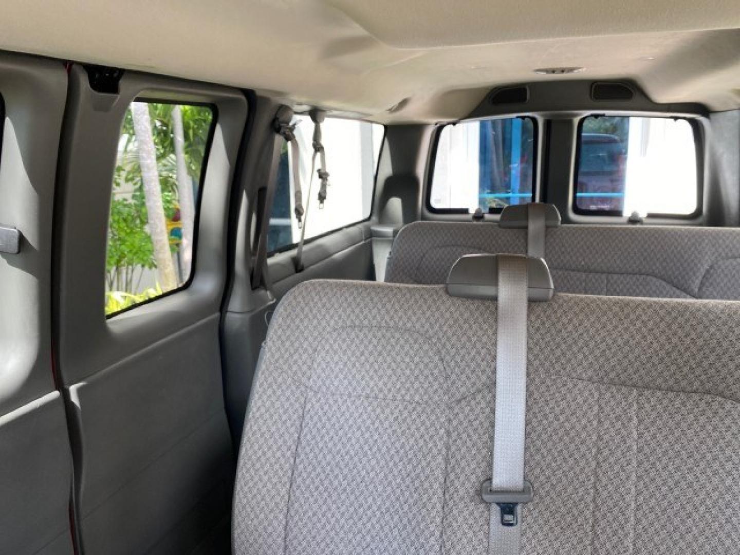 2009 Sport Red Metallic /Medium Pewter GMC Savana Passenger LOW MILES 53,014 1 OWNER 8 Passenger (1GKFG154891) with an 5.3L Vortec 1000 V8 SFI Engine engine, Automatic transmission, located at 4701 North Dixie Hwy, Pompano Beach, FL, 33064, (954) 422-2889, 26.240938, -80.123474 - OUR WEBPAGE FLORIDACARS1.COM HAS OVER 100 PHOTOS AND FREE CARFAX LINK 2009 GMC Savana LS 1500 1 OWNER 8 PASSENGER Van 5.3L V8 F OHV 16V Flex Fuel 16 MPG Rear Wheel Drive Features ABS Brakes Air Conditioning AM/FM Stereo Automatic Transmission CD Audio Cloth Seats Cruise Control Overhead Airbags Powe- Photo#71