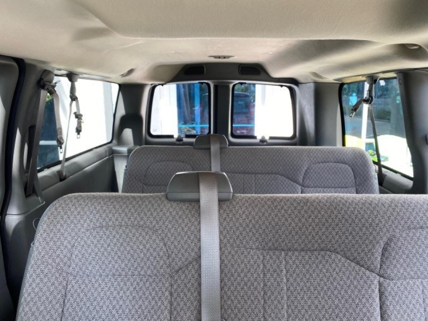2009 Sport Red Metallic /Medium Pewter GMC Savana Passenger LOW MILES 53,014 1 OWNER 8 Passenger (1GKFG154891) with an 5.3L Vortec 1000 V8 SFI Engine engine, Automatic transmission, located at 4701 North Dixie Hwy, Pompano Beach, FL, 33064, (954) 422-2889, 26.240938, -80.123474 - OUR WEBPAGE FLORIDACARS1.COM HAS OVER 100 PHOTOS AND FREE CARFAX LINK 2009 GMC Savana LS 1500 1 OWNER 8 PASSENGER Van 5.3L V8 F OHV 16V Flex Fuel 16 MPG Rear Wheel Drive Features ABS Brakes Air Conditioning AM/FM Stereo Automatic Transmission CD Audio Cloth Seats Cruise Control Overhead Airbags Powe- Photo#72