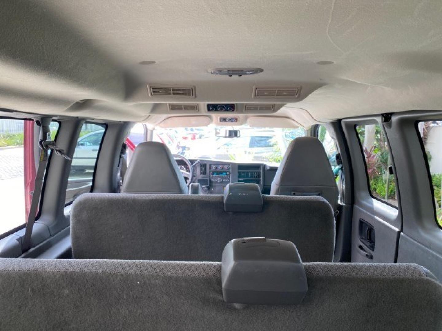 2009 Sport Red Metallic /Medium Pewter GMC Savana Passenger LOW MILES 53,014 1 OWNER 8 Passenger (1GKFG154891) with an 5.3L Vortec 1000 V8 SFI Engine engine, Automatic transmission, located at 4701 North Dixie Hwy, Pompano Beach, FL, 33064, (954) 422-2889, 26.240938, -80.123474 - OUR WEBPAGE FLORIDACARS1.COM HAS OVER 100 PHOTOS AND FREE CARFAX LINK 2009 GMC Savana LS 1500 1 OWNER 8 PASSENGER Van 5.3L V8 F OHV 16V Flex Fuel 16 MPG Rear Wheel Drive Features ABS Brakes Air Conditioning AM/FM Stereo Automatic Transmission CD Audio Cloth Seats Cruise Control Overhead Airbags Powe- Photo#77
