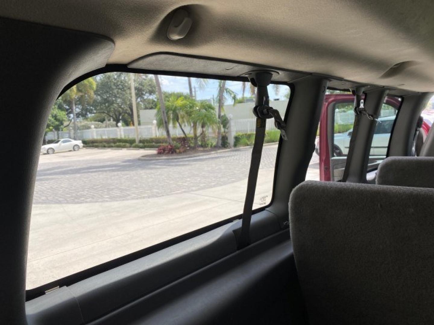 2009 Sport Red Metallic /Medium Pewter GMC Savana Passenger LOW MILES 53,014 1 OWNER 8 Passenger (1GKFG154891) with an 5.3L Vortec 1000 V8 SFI Engine engine, Automatic transmission, located at 4701 North Dixie Hwy, Pompano Beach, FL, 33064, (954) 422-2889, 26.240938, -80.123474 - OUR WEBPAGE FLORIDACARS1.COM HAS OVER 100 PHOTOS AND FREE CARFAX LINK 2009 GMC Savana LS 1500 1 OWNER 8 PASSENGER Van 5.3L V8 F OHV 16V Flex Fuel 16 MPG Rear Wheel Drive Features ABS Brakes Air Conditioning AM/FM Stereo Automatic Transmission CD Audio Cloth Seats Cruise Control Overhead Airbags Powe- Photo#78