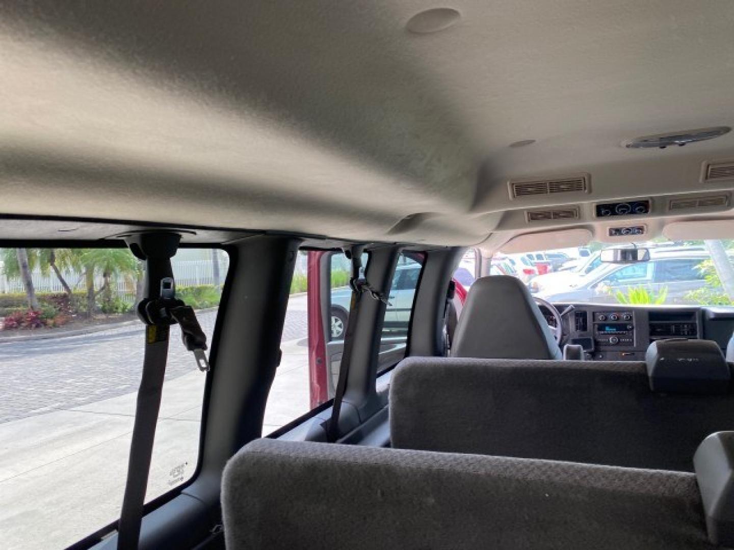 2009 Sport Red Metallic /Medium Pewter GMC Savana Passenger LOW MILES 53,014 1 OWNER 8 Passenger (1GKFG154891) with an 5.3L Vortec 1000 V8 SFI Engine engine, Automatic transmission, located at 4701 North Dixie Hwy, Pompano Beach, FL, 33064, (954) 422-2889, 26.240938, -80.123474 - OUR WEBPAGE FLORIDACARS1.COM HAS OVER 100 PHOTOS AND FREE CARFAX LINK 2009 GMC Savana LS 1500 1 OWNER 8 PASSENGER Van 5.3L V8 F OHV 16V Flex Fuel 16 MPG Rear Wheel Drive Features ABS Brakes Air Conditioning AM/FM Stereo Automatic Transmission CD Audio Cloth Seats Cruise Control Overhead Airbags Powe- Photo#79