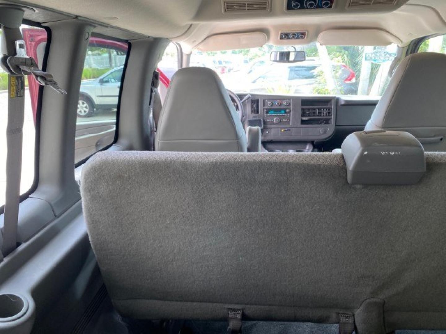 2009 Sport Red Metallic /Medium Pewter GMC Savana Passenger LOW MILES 53,014 1 OWNER 8 Passenger (1GKFG154891) with an 5.3L Vortec 1000 V8 SFI Engine engine, Automatic transmission, located at 4701 North Dixie Hwy, Pompano Beach, FL, 33064, (954) 422-2889, 26.240938, -80.123474 - OUR WEBPAGE FLORIDACARS1.COM HAS OVER 100 PHOTOS AND FREE CARFAX LINK 2009 GMC Savana LS 1500 1 OWNER 8 PASSENGER Van 5.3L V8 F OHV 16V Flex Fuel 16 MPG Rear Wheel Drive Features ABS Brakes Air Conditioning AM/FM Stereo Automatic Transmission CD Audio Cloth Seats Cruise Control Overhead Airbags Powe- Photo#84