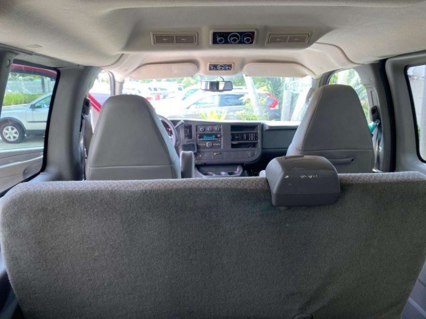 2009 Sport Red Metallic /Medium Pewter GMC Savana Passenger LOW MILES 53,014 1 OWNER 8 Passenger (1GKFG154891) with an 5.3L Vortec 1000 V8 SFI Engine engine, Automatic transmission, located at 4701 North Dixie Hwy, Pompano Beach, FL, 33064, (954) 422-2889, 26.240938, -80.123474 - OUR WEBPAGE FLORIDACARS1.COM HAS OVER 100 PHOTOS AND FREE CARFAX LINK 2009 GMC Savana LS 1500 1 OWNER 8 PASSENGER Van 5.3L V8 F OHV 16V Flex Fuel 16 MPG Rear Wheel Drive Features ABS Brakes Air Conditioning AM/FM Stereo Automatic Transmission CD Audio Cloth Seats Cruise Control Overhead Airbags Powe- Photo#85
