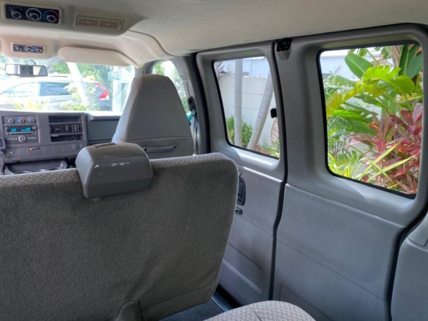 2009 Sport Red Metallic /Medium Pewter GMC Savana Passenger LOW MILES 53,014 1 OWNER 8 Passenger (1GKFG154891) with an 5.3L Vortec 1000 V8 SFI Engine engine, Automatic transmission, located at 4701 North Dixie Hwy, Pompano Beach, FL, 33064, (954) 422-2889, 26.240938, -80.123474 - OUR WEBPAGE FLORIDACARS1.COM HAS OVER 100 PHOTOS AND FREE CARFAX LINK 2009 GMC Savana LS 1500 1 OWNER 8 PASSENGER Van 5.3L V8 F OHV 16V Flex Fuel 16 MPG Rear Wheel Drive Features ABS Brakes Air Conditioning AM/FM Stereo Automatic Transmission CD Audio Cloth Seats Cruise Control Overhead Airbags Powe- Photo#86
