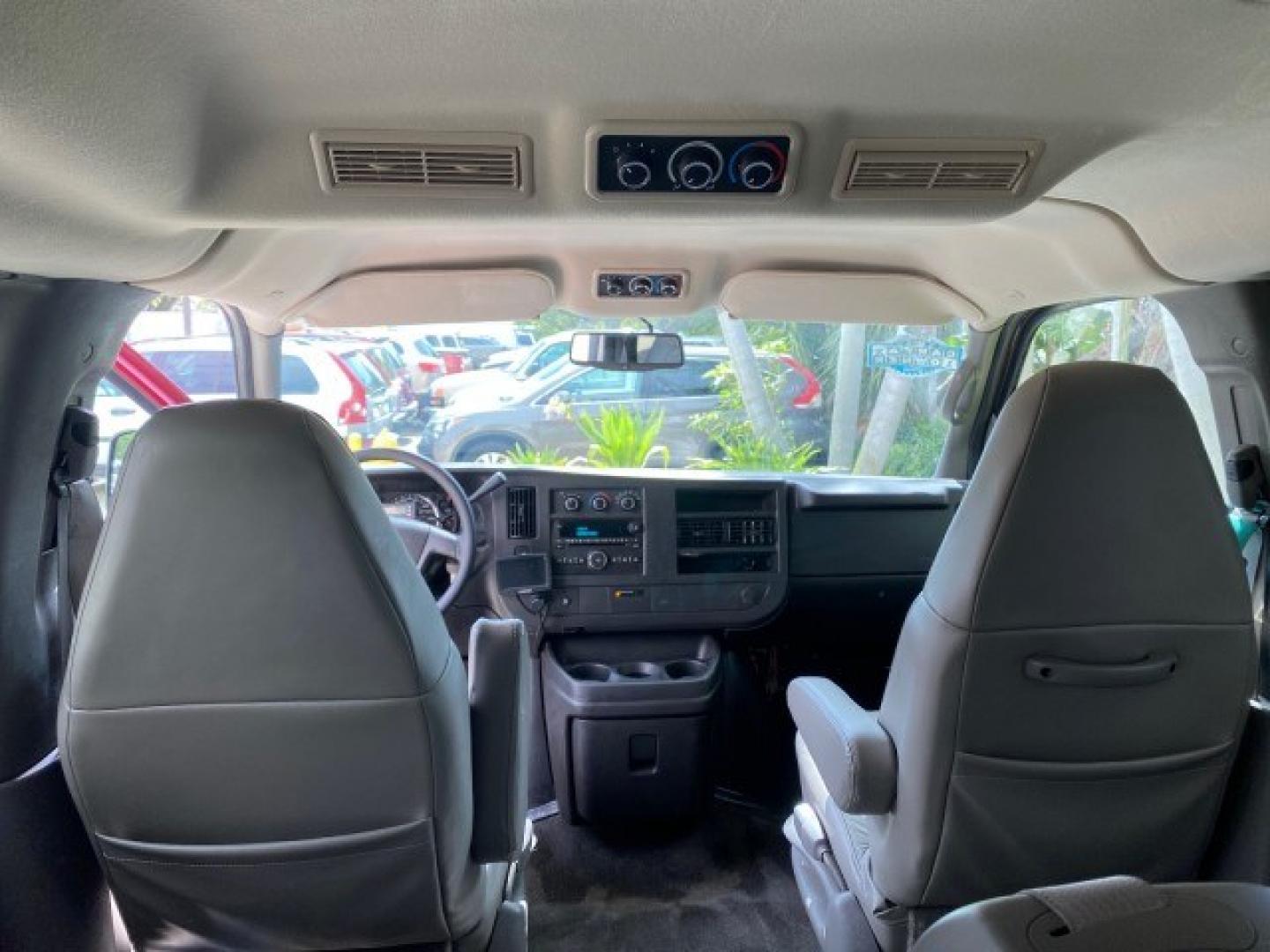2009 Sport Red Metallic /Medium Pewter GMC Savana Passenger LOW MILES 53,014 1 OWNER 8 Passenger (1GKFG154891) with an 5.3L Vortec 1000 V8 SFI Engine engine, Automatic transmission, located at 4701 North Dixie Hwy, Pompano Beach, FL, 33064, (954) 422-2889, 26.240938, -80.123474 - OUR WEBPAGE FLORIDACARS1.COM HAS OVER 100 PHOTOS AND FREE CARFAX LINK 2009 GMC Savana LS 1500 1 OWNER 8 PASSENGER Van 5.3L V8 F OHV 16V Flex Fuel 16 MPG Rear Wheel Drive Features ABS Brakes Air Conditioning AM/FM Stereo Automatic Transmission CD Audio Cloth Seats Cruise Control Overhead Airbags Powe- Photo#88