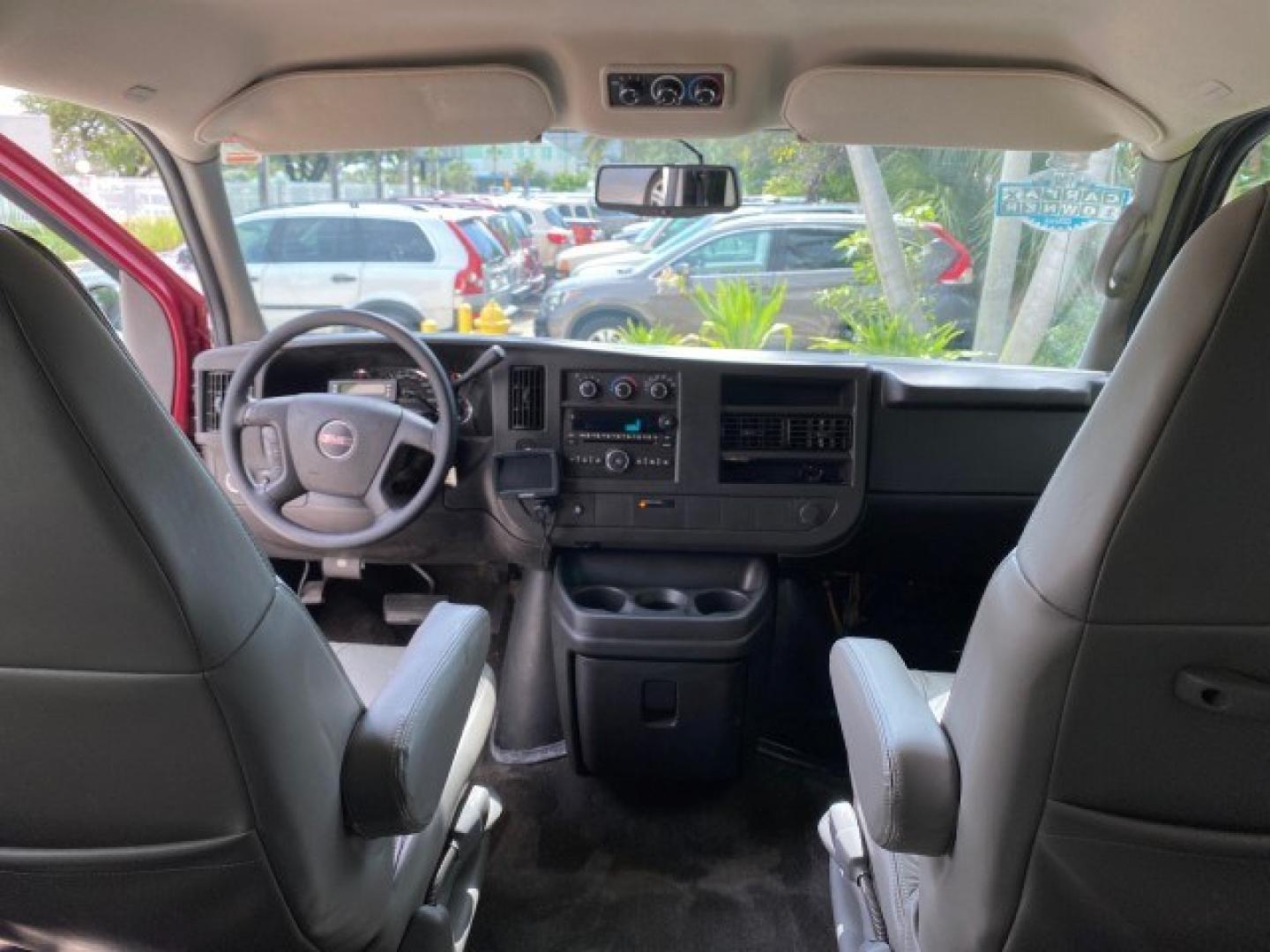 2009 Sport Red Metallic /Medium Pewter GMC Savana Passenger LOW MILES 53,014 1 OWNER 8 Passenger (1GKFG154891) with an 5.3L Vortec 1000 V8 SFI Engine engine, Automatic transmission, located at 4701 North Dixie Hwy, Pompano Beach, FL, 33064, (954) 422-2889, 26.240938, -80.123474 - OUR WEBPAGE FLORIDACARS1.COM HAS OVER 100 PHOTOS AND FREE CARFAX LINK 2009 GMC Savana LS 1500 1 OWNER 8 PASSENGER Van 5.3L V8 F OHV 16V Flex Fuel 16 MPG Rear Wheel Drive Features ABS Brakes Air Conditioning AM/FM Stereo Automatic Transmission CD Audio Cloth Seats Cruise Control Overhead Airbags Powe- Photo#90