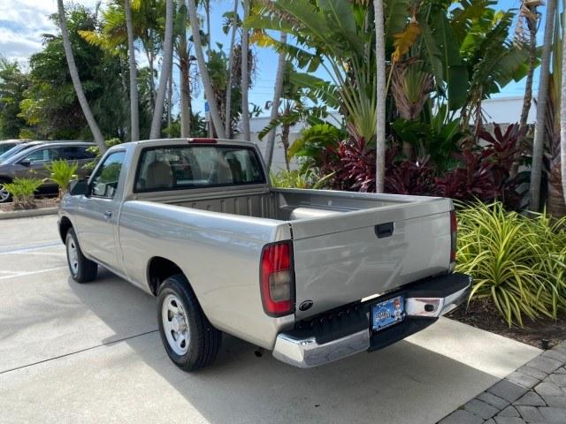 2000 Silver Ice Metallic /Gray Nissan Frontier 2WD AUTO AC XE LOW MILES 51,826 (1N6DD21S2YC) with an 2.4L DOHC SMPI 16-Valve 4-Cyl Engine engine, Automatic transmission, located at 4701 North Dixie Hwy, Pompano Beach, FL, 33064, (954) 422-2889, 26.240938, -80.123474 - OUR WEBPAGE FLORIDACARS1.COM HAS OVER 100 PHOTOS AND FREE CARFAX LINK 2000 Nissan Frontier XE Pickup 2.4L I4 F DOHC Gasoline 26 MPG Rear Wheel Drive Features ABS Brakes Air Conditioning AM/FM Stereo Automatic Transmission Cassette Player Cloth Seats 2000 Nissan Frontier XE Regular Cab is a hard-to-f- Photo#5
