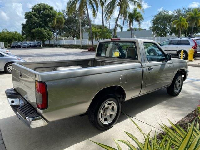2000 Silver Ice Metallic /Gray Nissan Frontier 2WD AUTO AC XE LOW MILES 51,826 (1N6DD21S2YC) with an 2.4L DOHC SMPI 16-Valve 4-Cyl Engine engine, Automatic transmission, located at 4701 North Dixie Hwy, Pompano Beach, FL, 33064, (954) 422-2889, 26.240938, -80.123474 - OUR WEBPAGE FLORIDACARS1.COM HAS OVER 100 PHOTOS AND FREE CARFAX LINK 2000 Nissan Frontier XE Pickup 2.4L I4 F DOHC Gasoline 26 MPG Rear Wheel Drive Features ABS Brakes Air Conditioning AM/FM Stereo Automatic Transmission Cassette Player Cloth Seats 2000 Nissan Frontier XE Regular Cab is a hard-to-f- Photo#7