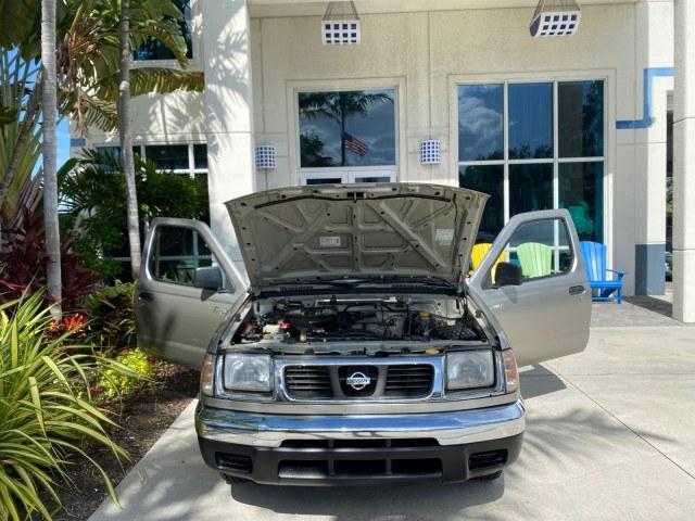 2000 Silver Ice Metallic /Gray Nissan Frontier 2WD AUTO AC XE LOW MILES 51,826 (1N6DD21S2YC) with an 2.4L DOHC SMPI 16-Valve 4-Cyl Engine engine, Automatic transmission, located at 4701 North Dixie Hwy, Pompano Beach, FL, 33064, (954) 422-2889, 26.240938, -80.123474 - OUR WEBPAGE FLORIDACARS1.COM HAS OVER 100 PHOTOS AND FREE CARFAX LINK 2000 Nissan Frontier XE Pickup 2.4L I4 F DOHC Gasoline 26 MPG Rear Wheel Drive Features ABS Brakes Air Conditioning AM/FM Stereo Automatic Transmission Cassette Player Cloth Seats 2000 Nissan Frontier XE Regular Cab is a hard-to-f- Photo#16