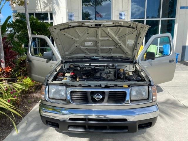 2000 Silver Ice Metallic /Gray Nissan Frontier 2WD AUTO AC XE LOW MILES 51,826 (1N6DD21S2YC) with an 2.4L DOHC SMPI 16-Valve 4-Cyl Engine engine, Automatic transmission, located at 4701 North Dixie Hwy, Pompano Beach, FL, 33064, (954) 422-2889, 26.240938, -80.123474 - OUR WEBPAGE FLORIDACARS1.COM HAS OVER 100 PHOTOS AND FREE CARFAX LINK 2000 Nissan Frontier XE Pickup 2.4L I4 F DOHC Gasoline 26 MPG Rear Wheel Drive Features ABS Brakes Air Conditioning AM/FM Stereo Automatic Transmission Cassette Player Cloth Seats 2000 Nissan Frontier XE Regular Cab is a hard-to-f- Photo#17