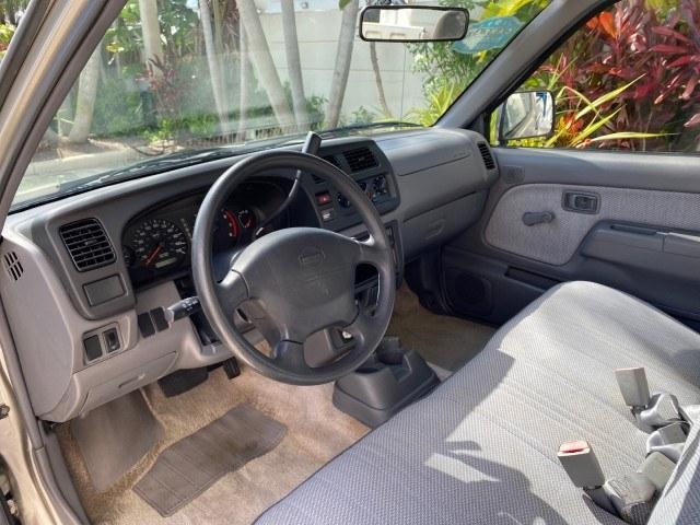 2000 Silver Ice Metallic /Gray Nissan Frontier 2WD AUTO AC XE LOW MILES 51,826 (1N6DD21S2YC) with an 2.4L DOHC SMPI 16-Valve 4-Cyl Engine engine, Automatic transmission, located at 4701 North Dixie Hwy, Pompano Beach, FL, 33064, (954) 422-2889, 26.240938, -80.123474 - OUR WEBPAGE FLORIDACARS1.COM HAS OVER 100 PHOTOS AND FREE CARFAX LINK 2000 Nissan Frontier XE Pickup 2.4L I4 F DOHC Gasoline 26 MPG Rear Wheel Drive Features ABS Brakes Air Conditioning AM/FM Stereo Automatic Transmission Cassette Player Cloth Seats 2000 Nissan Frontier XE Regular Cab is a hard-to-f- Photo#48