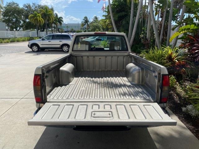2000 Silver Ice Metallic /Gray Nissan Frontier 2WD AUTO AC XE LOW MILES 51,826 (1N6DD21S2YC) with an 2.4L DOHC SMPI 16-Valve 4-Cyl Engine engine, Automatic transmission, located at 4701 North Dixie Hwy, Pompano Beach, FL, 33064, (954) 422-2889, 26.240938, -80.123474 - OUR WEBPAGE FLORIDACARS1.COM HAS OVER 100 PHOTOS AND FREE CARFAX LINK 2000 Nissan Frontier XE Pickup 2.4L I4 F DOHC Gasoline 26 MPG Rear Wheel Drive Features ABS Brakes Air Conditioning AM/FM Stereo Automatic Transmission Cassette Player Cloth Seats 2000 Nissan Frontier XE Regular Cab is a hard-to-f- Photo#90