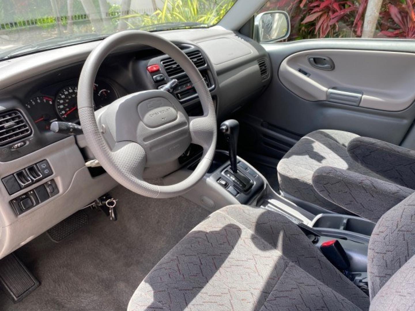 2003 Silver Leaf Metallic /Medium Gray Chevrolet Tracker LT LOW MILES 45,920 1 OWNER (2CNBE634X36) with an 2.5L DOHC 24-Valve V6 Multi-Port Fuel Injection Engine engine, Automatic transmission, located at 4701 North Dixie Hwy, Pompano Beach, FL, 33064, (954) 422-2889, 26.240938, -80.123474 - OUR WEBPAGE FLORIDACARS1.COM HAS OVER 100 PHOTOS AND FREE CARFAX LINK 2003 Chevrolet Tracker LT 1 OWNER 4 Door Wagon/Sport Utility 2.5L V6 F DOHC Gasoline 21 MPG Rear Wheel Drive Features Air Conditioning AM/FM Stereo Automatic Transmission CD Audio Cloth Seats Power Locks Power Mirrors Power Window- Photo#47