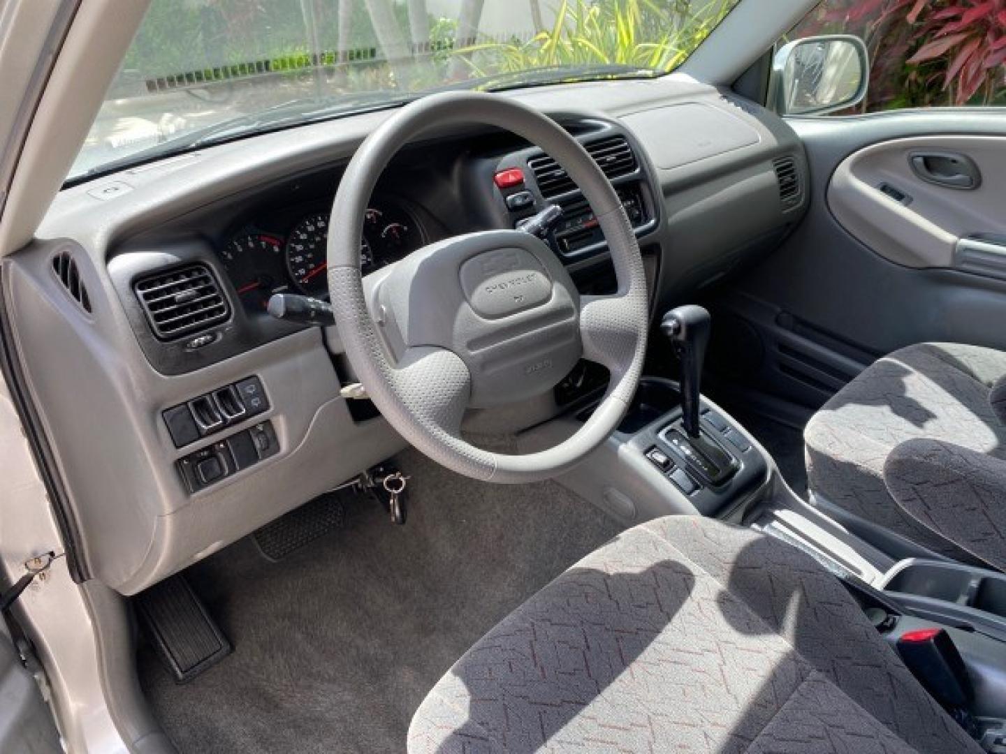 2003 Silver Leaf Metallic /Medium Gray Chevrolet Tracker LT LOW MILES 45,920 1 OWNER (2CNBE634X36) with an 2.5L DOHC 24-Valve V6 Multi-Port Fuel Injection Engine engine, Automatic transmission, located at 4701 North Dixie Hwy, Pompano Beach, FL, 33064, (954) 422-2889, 26.240938, -80.123474 - OUR WEBPAGE FLORIDACARS1.COM HAS OVER 100 PHOTOS AND FREE CARFAX LINK 2003 Chevrolet Tracker LT 1 OWNER 4 Door Wagon/Sport Utility 2.5L V6 F DOHC Gasoline 21 MPG Rear Wheel Drive Features Air Conditioning AM/FM Stereo Automatic Transmission CD Audio Cloth Seats Power Locks Power Mirrors Power Window- Photo#48