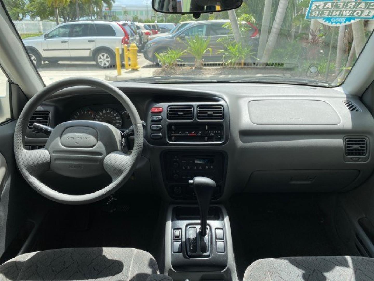 2003 Silver Leaf Metallic /Medium Gray Chevrolet Tracker LT LOW MILES 45,920 1 OWNER (2CNBE634X36) with an 2.5L DOHC 24-Valve V6 Multi-Port Fuel Injection Engine engine, Automatic transmission, located at 4701 North Dixie Hwy, Pompano Beach, FL, 33064, (954) 422-2889, 26.240938, -80.123474 - OUR WEBPAGE FLORIDACARS1.COM HAS OVER 100 PHOTOS AND FREE CARFAX LINK 2003 Chevrolet Tracker LT 1 OWNER 4 Door Wagon/Sport Utility 2.5L V6 F DOHC Gasoline 21 MPG Rear Wheel Drive Features Air Conditioning AM/FM Stereo Automatic Transmission CD Audio Cloth Seats Power Locks Power Mirrors Power Window- Photo#76