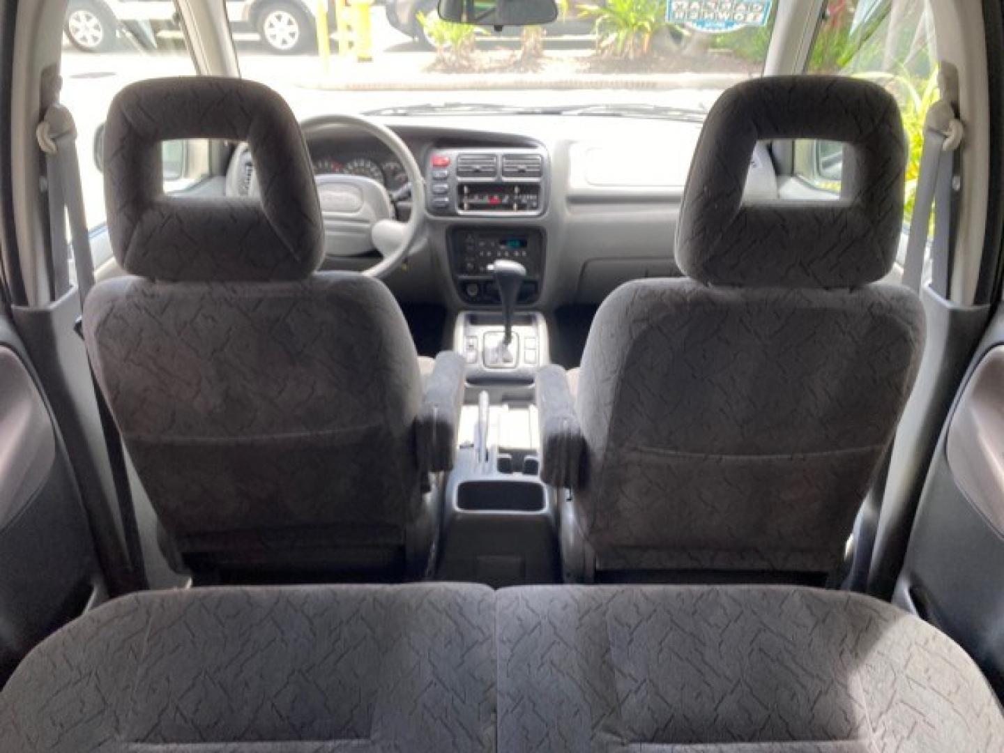 2003 Silver Leaf Metallic /Medium Gray Chevrolet Tracker LT LOW MILES 45,920 1 OWNER (2CNBE634X36) with an 2.5L DOHC 24-Valve V6 Multi-Port Fuel Injection Engine engine, Automatic transmission, located at 4701 North Dixie Hwy, Pompano Beach, FL, 33064, (954) 422-2889, 26.240938, -80.123474 - OUR WEBPAGE FLORIDACARS1.COM HAS OVER 100 PHOTOS AND FREE CARFAX LINK 2003 Chevrolet Tracker LT 1 OWNER 4 Door Wagon/Sport Utility 2.5L V6 F DOHC Gasoline 21 MPG Rear Wheel Drive Features Air Conditioning AM/FM Stereo Automatic Transmission CD Audio Cloth Seats Power Locks Power Mirrors Power Window- Photo#97