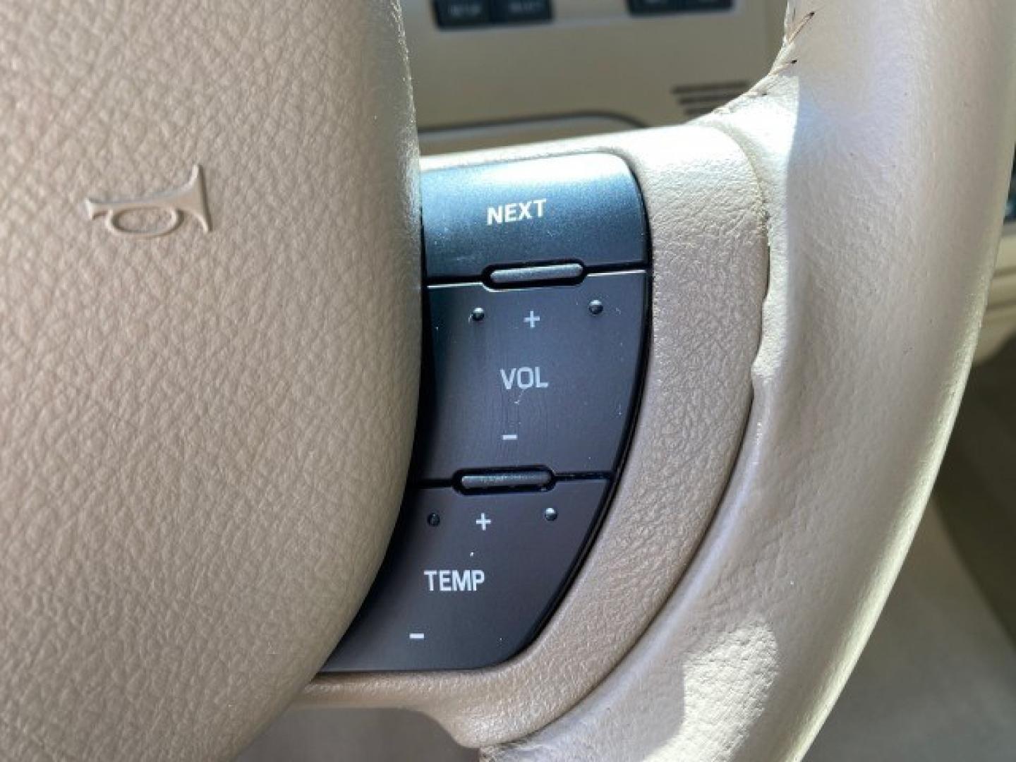 2008 Light French Silk Metallic /Light Camel Lincoln Town Car Limited LOW MILES 29,278 1 OWNER (2LNHM82V48X) with an 4.6L SOHC FFV V8 Engine engine, Automatic transmission, located at 4701 North Dixie Hwy, Pompano Beach, FL, 33064, (954) 422-2889, 26.240938, -80.123474 - OUR WEBPAGE FLORIDACARS1.COM HAS OVER 100 PHOTOS AND FREE CARFAX LINK 2008 Lincoln Town Car Signature Limited 1 OWNER Sedan 4 DR 4.6L V8 F SOHC Flex Fuel 23 MPG Rear Wheel Drive Features ABS Brakes Air Conditioning Alloy Wheels AM/FM Stereo Automatic Transmission CD Audio Cruise Control Flex Fuel Ve- Photo#52
