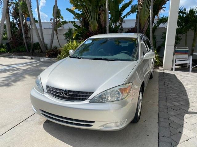 2003 Lunar Mist Metallic /Stone Toyota Camry AC AUTO LE LOW MILES 66,649 (4T1BE32K23U) with an 2.4L DOHC Vvti 16-Valve 4-Cyl Engine engine, Automatic transmission, located at 4701 North Dixie Hwy, Pompano Beach, FL, 33064, (954) 422-2889, 26.240938, -80.123474 - OUR WEBPAGE FLORIDACARS1.COM HAS OVER 100 PHOTOS AND FREE CARFAX LINK 2003 Toyota Camry LE Sedan 4 DR 2.4L I4 F DOHC 16V Gasoline 32 MPG Front Wheel Drive Features Air Conditioning AM/FM Stereo Automatic Transmission Cassette Player CD Audio Cloth Seats Cruise Control Power Locks Power Mirrors Power- Photo#3