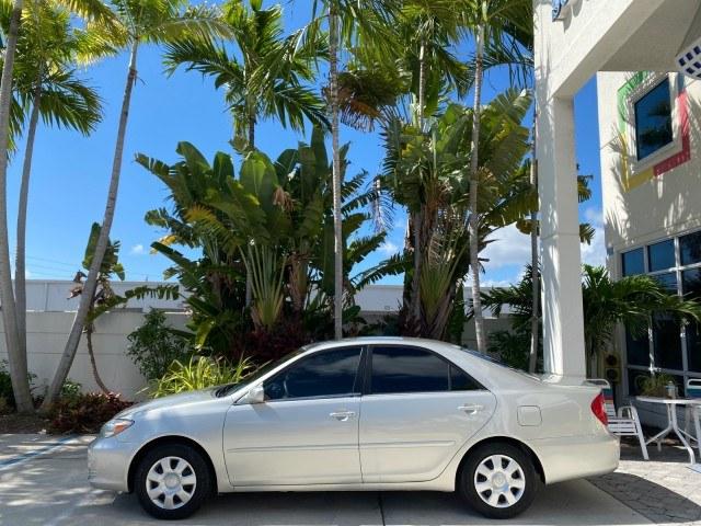 2003 Lunar Mist Metallic /Stone Toyota Camry AC AUTO LE LOW MILES 66,649 (4T1BE32K23U) with an 2.4L DOHC Vvti 16-Valve 4-Cyl Engine engine, Automatic transmission, located at 4701 North Dixie Hwy, Pompano Beach, FL, 33064, (954) 422-2889, 26.240938, -80.123474 - OUR WEBPAGE FLORIDACARS1.COM HAS OVER 100 PHOTOS AND FREE CARFAX LINK 2003 Toyota Camry LE Sedan 4 DR 2.4L I4 F DOHC 16V Gasoline 32 MPG Front Wheel Drive Features Air Conditioning AM/FM Stereo Automatic Transmission Cassette Player CD Audio Cloth Seats Cruise Control Power Locks Power Mirrors Power- Photo#4
