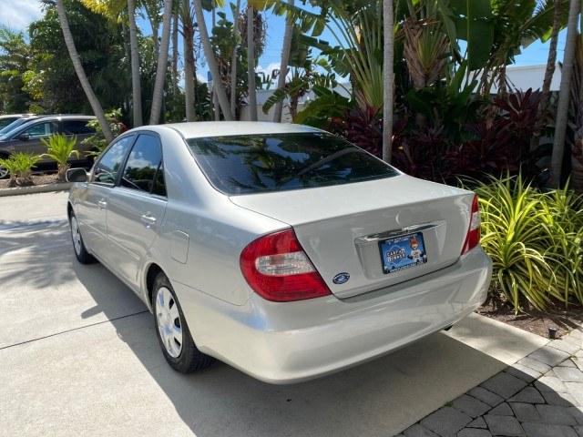 2003 Lunar Mist Metallic /Stone Toyota Camry AC AUTO LE LOW MILES 66,649 (4T1BE32K23U) with an 2.4L DOHC Vvti 16-Valve 4-Cyl Engine engine, Automatic transmission, located at 4701 North Dixie Hwy, Pompano Beach, FL, 33064, (954) 422-2889, 26.240938, -80.123474 - OUR WEBPAGE FLORIDACARS1.COM HAS OVER 100 PHOTOS AND FREE CARFAX LINK 2003 Toyota Camry LE Sedan 4 DR 2.4L I4 F DOHC 16V Gasoline 32 MPG Front Wheel Drive Features Air Conditioning AM/FM Stereo Automatic Transmission Cassette Player CD Audio Cloth Seats Cruise Control Power Locks Power Mirrors Power- Photo#5
