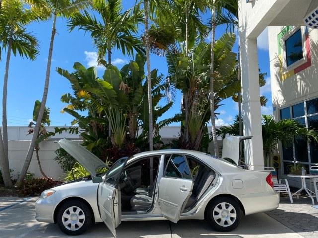 2003 Lunar Mist Metallic /Stone Toyota Camry AC AUTO LE LOW MILES 66,649 (4T1BE32K23U) with an 2.4L DOHC Vvti 16-Valve 4-Cyl Engine engine, Automatic transmission, located at 4701 North Dixie Hwy, Pompano Beach, FL, 33064, (954) 422-2889, 26.240938, -80.123474 - OUR WEBPAGE FLORIDACARS1.COM HAS OVER 100 PHOTOS AND FREE CARFAX LINK 2003 Toyota Camry LE Sedan 4 DR 2.4L I4 F DOHC 16V Gasoline 32 MPG Front Wheel Drive Features Air Conditioning AM/FM Stereo Automatic Transmission Cassette Player CD Audio Cloth Seats Cruise Control Power Locks Power Mirrors Power- Photo#8