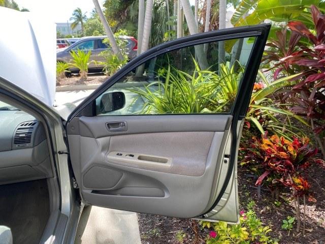 2003 Lunar Mist Metallic /Stone Toyota Camry AC AUTO LE LOW MILES 66,649 (4T1BE32K23U) with an 2.4L DOHC Vvti 16-Valve 4-Cyl Engine engine, Automatic transmission, located at 4701 North Dixie Hwy, Pompano Beach, FL, 33064, (954) 422-2889, 26.240938, -80.123474 - OUR WEBPAGE FLORIDACARS1.COM HAS OVER 100 PHOTOS AND FREE CARFAX LINK 2003 Toyota Camry LE Sedan 4 DR 2.4L I4 F DOHC 16V Gasoline 32 MPG Front Wheel Drive Features Air Conditioning AM/FM Stereo Automatic Transmission Cassette Player CD Audio Cloth Seats Cruise Control Power Locks Power Mirrors Power- Photo#11