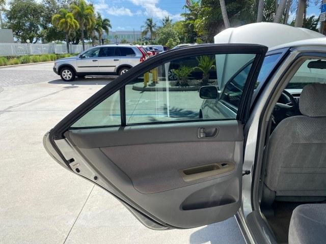 2003 Lunar Mist Metallic /Stone Toyota Camry AC AUTO LE LOW MILES 66,649 (4T1BE32K23U) with an 2.4L DOHC Vvti 16-Valve 4-Cyl Engine engine, Automatic transmission, located at 4701 North Dixie Hwy, Pompano Beach, FL, 33064, (954) 422-2889, 26.240938, -80.123474 - OUR WEBPAGE FLORIDACARS1.COM HAS OVER 100 PHOTOS AND FREE CARFAX LINK 2003 Toyota Camry LE Sedan 4 DR 2.4L I4 F DOHC 16V Gasoline 32 MPG Front Wheel Drive Features Air Conditioning AM/FM Stereo Automatic Transmission Cassette Player CD Audio Cloth Seats Cruise Control Power Locks Power Mirrors Power- Photo#13