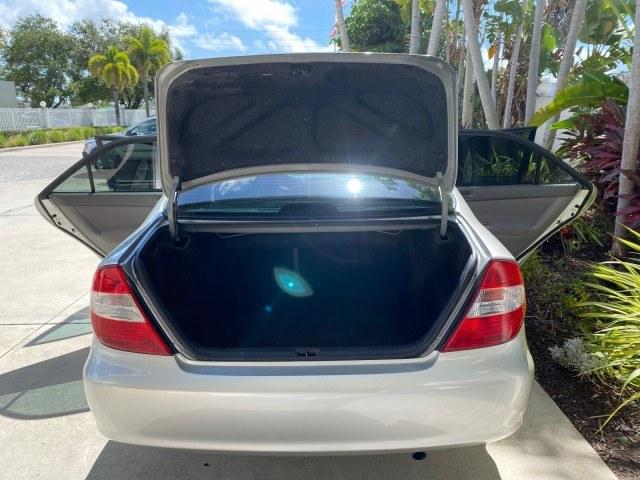 2003 Lunar Mist Metallic /Stone Toyota Camry AC AUTO LE LOW MILES 66,649 (4T1BE32K23U) with an 2.4L DOHC Vvti 16-Valve 4-Cyl Engine engine, Automatic transmission, located at 4701 North Dixie Hwy, Pompano Beach, FL, 33064, (954) 422-2889, 26.240938, -80.123474 - OUR WEBPAGE FLORIDACARS1.COM HAS OVER 100 PHOTOS AND FREE CARFAX LINK 2003 Toyota Camry LE Sedan 4 DR 2.4L I4 F DOHC 16V Gasoline 32 MPG Front Wheel Drive Features Air Conditioning AM/FM Stereo Automatic Transmission Cassette Player CD Audio Cloth Seats Cruise Control Power Locks Power Mirrors Power- Photo#15