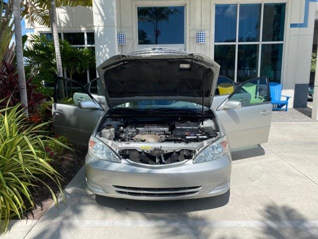2003 Lunar Mist Metallic /Stone Toyota Camry AC AUTO LE LOW MILES 66,649 (4T1BE32K23U) with an 2.4L DOHC Vvti 16-Valve 4-Cyl Engine engine, Automatic transmission, located at 4701 North Dixie Hwy, Pompano Beach, FL, 33064, (954) 422-2889, 26.240938, -80.123474 - OUR WEBPAGE FLORIDACARS1.COM HAS OVER 100 PHOTOS AND FREE CARFAX LINK 2003 Toyota Camry LE Sedan 4 DR 2.4L I4 F DOHC 16V Gasoline 32 MPG Front Wheel Drive Features Air Conditioning AM/FM Stereo Automatic Transmission Cassette Player CD Audio Cloth Seats Cruise Control Power Locks Power Mirrors Power- Photo#16