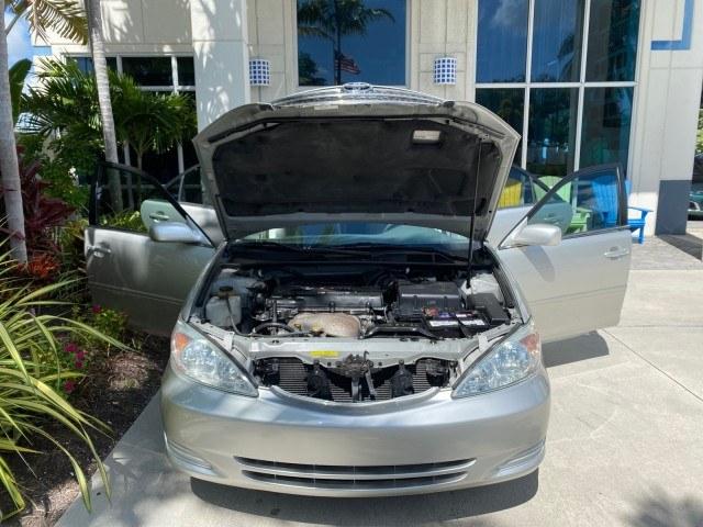2003 Lunar Mist Metallic /Stone Toyota Camry AC AUTO LE LOW MILES 66,649 (4T1BE32K23U) with an 2.4L DOHC Vvti 16-Valve 4-Cyl Engine engine, Automatic transmission, located at 4701 North Dixie Hwy, Pompano Beach, FL, 33064, (954) 422-2889, 26.240938, -80.123474 - OUR WEBPAGE FLORIDACARS1.COM HAS OVER 100 PHOTOS AND FREE CARFAX LINK 2003 Toyota Camry LE Sedan 4 DR 2.4L I4 F DOHC 16V Gasoline 32 MPG Front Wheel Drive Features Air Conditioning AM/FM Stereo Automatic Transmission Cassette Player CD Audio Cloth Seats Cruise Control Power Locks Power Mirrors Power- Photo#17