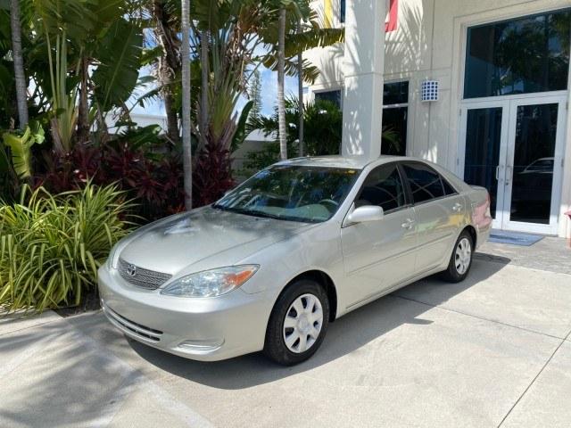 2003 Lunar Mist Metallic /Stone Toyota Camry AC AUTO LE LOW MILES 66,649 (4T1BE32K23U) with an 2.4L DOHC Vvti 16-Valve 4-Cyl Engine engine, Automatic transmission, located at 4701 North Dixie Hwy, Pompano Beach, FL, 33064, (954) 422-2889, 26.240938, -80.123474 - OUR WEBPAGE FLORIDACARS1.COM HAS OVER 100 PHOTOS AND FREE CARFAX LINK 2003 Toyota Camry LE Sedan 4 DR 2.4L I4 F DOHC 16V Gasoline 32 MPG Front Wheel Drive Features Air Conditioning AM/FM Stereo Automatic Transmission Cassette Player CD Audio Cloth Seats Cruise Control Power Locks Power Mirrors Power- Photo#28