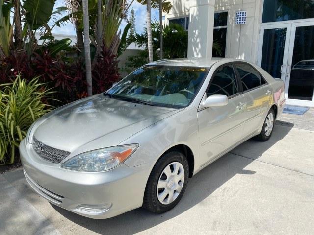 2003 Lunar Mist Metallic /Stone Toyota Camry AC AUTO LE LOW MILES 66,649 (4T1BE32K23U) with an 2.4L DOHC Vvti 16-Valve 4-Cyl Engine engine, Automatic transmission, located at 4701 North Dixie Hwy, Pompano Beach, FL, 33064, (954) 422-2889, 26.240938, -80.123474 - OUR WEBPAGE FLORIDACARS1.COM HAS OVER 100 PHOTOS AND FREE CARFAX LINK 2003 Toyota Camry LE Sedan 4 DR 2.4L I4 F DOHC 16V Gasoline 32 MPG Front Wheel Drive Features Air Conditioning AM/FM Stereo Automatic Transmission Cassette Player CD Audio Cloth Seats Cruise Control Power Locks Power Mirrors Power- Photo#29