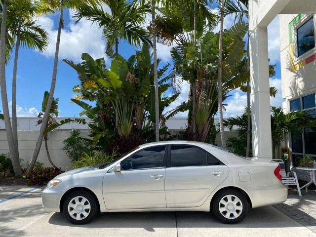 2003 Lunar Mist Metallic /Stone Toyota Camry AC AUTO LE LOW MILES 66,649 (4T1BE32K23U) with an 2.4L DOHC Vvti 16-Valve 4-Cyl Engine engine, Automatic transmission, located at 4701 North Dixie Hwy, Pompano Beach, FL, 33064, (954) 422-2889, 26.240938, -80.123474 - OUR WEBPAGE FLORIDACARS1.COM HAS OVER 100 PHOTOS AND FREE CARFAX LINK 2003 Toyota Camry LE Sedan 4 DR 2.4L I4 F DOHC 16V Gasoline 32 MPG Front Wheel Drive Features Air Conditioning AM/FM Stereo Automatic Transmission Cassette Player CD Audio Cloth Seats Cruise Control Power Locks Power Mirrors Power- Photo#30