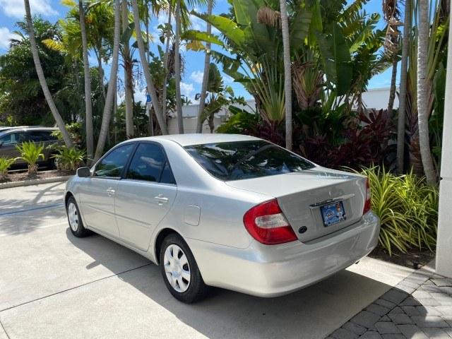2003 Lunar Mist Metallic /Stone Toyota Camry AC AUTO LE LOW MILES 66,649 (4T1BE32K23U) with an 2.4L DOHC Vvti 16-Valve 4-Cyl Engine engine, Automatic transmission, located at 4701 North Dixie Hwy, Pompano Beach, FL, 33064, (954) 422-2889, 26.240938, -80.123474 - OUR WEBPAGE FLORIDACARS1.COM HAS OVER 100 PHOTOS AND FREE CARFAX LINK 2003 Toyota Camry LE Sedan 4 DR 2.4L I4 F DOHC 16V Gasoline 32 MPG Front Wheel Drive Features Air Conditioning AM/FM Stereo Automatic Transmission Cassette Player CD Audio Cloth Seats Cruise Control Power Locks Power Mirrors Power- Photo#32