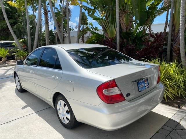 2003 Lunar Mist Metallic /Stone Toyota Camry AC AUTO LE LOW MILES 66,649 (4T1BE32K23U) with an 2.4L DOHC Vvti 16-Valve 4-Cyl Engine engine, Automatic transmission, located at 4701 North Dixie Hwy, Pompano Beach, FL, 33064, (954) 422-2889, 26.240938, -80.123474 - OUR WEBPAGE FLORIDACARS1.COM HAS OVER 100 PHOTOS AND FREE CARFAX LINK 2003 Toyota Camry LE Sedan 4 DR 2.4L I4 F DOHC 16V Gasoline 32 MPG Front Wheel Drive Features Air Conditioning AM/FM Stereo Automatic Transmission Cassette Player CD Audio Cloth Seats Cruise Control Power Locks Power Mirrors Power- Photo#33