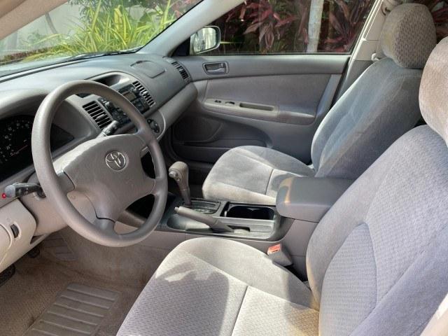 2003 Lunar Mist Metallic /Stone Toyota Camry AC AUTO LE LOW MILES 66,649 (4T1BE32K23U) with an 2.4L DOHC Vvti 16-Valve 4-Cyl Engine engine, Automatic transmission, located at 4701 North Dixie Hwy, Pompano Beach, FL, 33064, (954) 422-2889, 26.240938, -80.123474 - OUR WEBPAGE FLORIDACARS1.COM HAS OVER 100 PHOTOS AND FREE CARFAX LINK 2003 Toyota Camry LE Sedan 4 DR 2.4L I4 F DOHC 16V Gasoline 32 MPG Front Wheel Drive Features Air Conditioning AM/FM Stereo Automatic Transmission Cassette Player CD Audio Cloth Seats Cruise Control Power Locks Power Mirrors Power- Photo#45