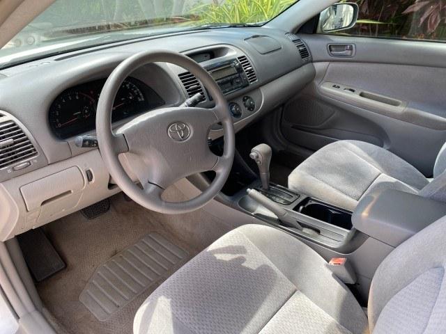 2003 Lunar Mist Metallic /Stone Toyota Camry AC AUTO LE LOW MILES 66,649 (4T1BE32K23U) with an 2.4L DOHC Vvti 16-Valve 4-Cyl Engine engine, Automatic transmission, located at 4701 North Dixie Hwy, Pompano Beach, FL, 33064, (954) 422-2889, 26.240938, -80.123474 - OUR WEBPAGE FLORIDACARS1.COM HAS OVER 100 PHOTOS AND FREE CARFAX LINK 2003 Toyota Camry LE Sedan 4 DR 2.4L I4 F DOHC 16V Gasoline 32 MPG Front Wheel Drive Features Air Conditioning AM/FM Stereo Automatic Transmission Cassette Player CD Audio Cloth Seats Cruise Control Power Locks Power Mirrors Power- Photo#47