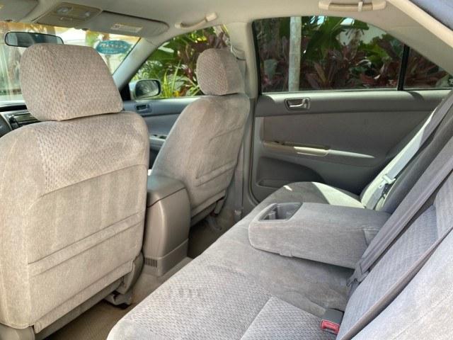 2003 Lunar Mist Metallic /Stone Toyota Camry AC AUTO LE LOW MILES 66,649 (4T1BE32K23U) with an 2.4L DOHC Vvti 16-Valve 4-Cyl Engine engine, Automatic transmission, located at 4701 North Dixie Hwy, Pompano Beach, FL, 33064, (954) 422-2889, 26.240938, -80.123474 - OUR WEBPAGE FLORIDACARS1.COM HAS OVER 100 PHOTOS AND FREE CARFAX LINK 2003 Toyota Camry LE Sedan 4 DR 2.4L I4 F DOHC 16V Gasoline 32 MPG Front Wheel Drive Features Air Conditioning AM/FM Stereo Automatic Transmission Cassette Player CD Audio Cloth Seats Cruise Control Power Locks Power Mirrors Power- Photo#77