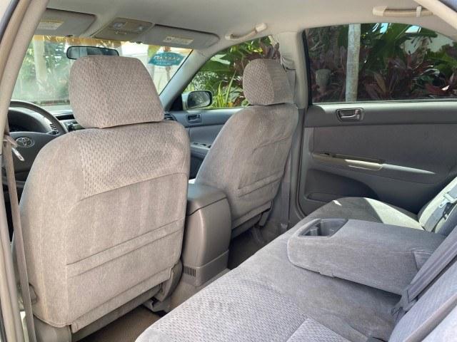 2003 Lunar Mist Metallic /Stone Toyota Camry AC AUTO LE LOW MILES 66,649 (4T1BE32K23U) with an 2.4L DOHC Vvti 16-Valve 4-Cyl Engine engine, Automatic transmission, located at 4701 North Dixie Hwy, Pompano Beach, FL, 33064, (954) 422-2889, 26.240938, -80.123474 - OUR WEBPAGE FLORIDACARS1.COM HAS OVER 100 PHOTOS AND FREE CARFAX LINK 2003 Toyota Camry LE Sedan 4 DR 2.4L I4 F DOHC 16V Gasoline 32 MPG Front Wheel Drive Features Air Conditioning AM/FM Stereo Automatic Transmission Cassette Player CD Audio Cloth Seats Cruise Control Power Locks Power Mirrors Power- Photo#78