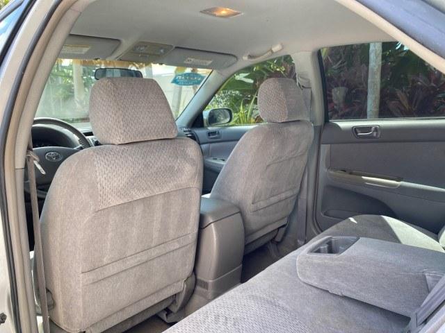 2003 Lunar Mist Metallic /Stone Toyota Camry AC AUTO LE LOW MILES 66,649 (4T1BE32K23U) with an 2.4L DOHC Vvti 16-Valve 4-Cyl Engine engine, Automatic transmission, located at 4701 North Dixie Hwy, Pompano Beach, FL, 33064, (954) 422-2889, 26.240938, -80.123474 - OUR WEBPAGE FLORIDACARS1.COM HAS OVER 100 PHOTOS AND FREE CARFAX LINK 2003 Toyota Camry LE Sedan 4 DR 2.4L I4 F DOHC 16V Gasoline 32 MPG Front Wheel Drive Features Air Conditioning AM/FM Stereo Automatic Transmission Cassette Player CD Audio Cloth Seats Cruise Control Power Locks Power Mirrors Power- Photo#79