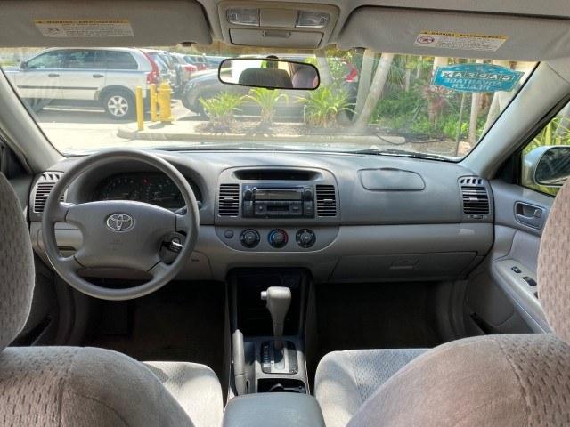 2003 Lunar Mist Metallic /Stone Toyota Camry AC AUTO LE LOW MILES 66,649 (4T1BE32K23U) with an 2.4L DOHC Vvti 16-Valve 4-Cyl Engine engine, Automatic transmission, located at 4701 North Dixie Hwy, Pompano Beach, FL, 33064, (954) 422-2889, 26.240938, -80.123474 - OUR WEBPAGE FLORIDACARS1.COM HAS OVER 100 PHOTOS AND FREE CARFAX LINK 2003 Toyota Camry LE Sedan 4 DR 2.4L I4 F DOHC 16V Gasoline 32 MPG Front Wheel Drive Features Air Conditioning AM/FM Stereo Automatic Transmission Cassette Player CD Audio Cloth Seats Cruise Control Power Locks Power Mirrors Power- Photo#81