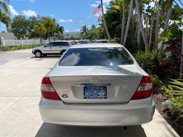 2003 Lunar Mist Metallic /Stone Toyota Camry AC AUTO LE LOW MILES 66,649 (4T1BE32K23U) with an 2.4L DOHC Vvti 16-Valve 4-Cyl Engine engine, Automatic transmission, located at 4701 North Dixie Hwy, Pompano Beach, FL, 33064, (954) 422-2889, 26.240938, -80.123474 - OUR WEBPAGE FLORIDACARS1.COM HAS OVER 100 PHOTOS AND FREE CARFAX LINK 2003 Toyota Camry LE Sedan 4 DR 2.4L I4 F DOHC 16V Gasoline 32 MPG Front Wheel Drive Features Air Conditioning AM/FM Stereo Automatic Transmission Cassette Player CD Audio Cloth Seats Cruise Control Power Locks Power Mirrors Power- Photo#88