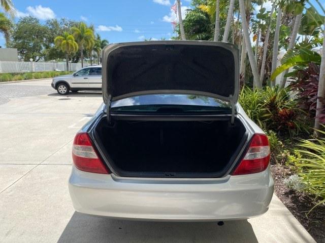 2003 Lunar Mist Metallic /Stone Toyota Camry AC AUTO LE LOW MILES 66,649 (4T1BE32K23U) with an 2.4L DOHC Vvti 16-Valve 4-Cyl Engine engine, Automatic transmission, located at 4701 North Dixie Hwy, Pompano Beach, FL, 33064, (954) 422-2889, 26.240938, -80.123474 - OUR WEBPAGE FLORIDACARS1.COM HAS OVER 100 PHOTOS AND FREE CARFAX LINK 2003 Toyota Camry LE Sedan 4 DR 2.4L I4 F DOHC 16V Gasoline 32 MPG Front Wheel Drive Features Air Conditioning AM/FM Stereo Automatic Transmission Cassette Player CD Audio Cloth Seats Cruise Control Power Locks Power Mirrors Power- Photo#93