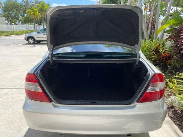 2003 Lunar Mist Metallic /Stone Toyota Camry AC AUTO LE LOW MILES 66,649 (4T1BE32K23U) with an 2.4L DOHC Vvti 16-Valve 4-Cyl Engine engine, Automatic transmission, located at 4701 North Dixie Hwy, Pompano Beach, FL, 33064, (954) 422-2889, 26.240938, -80.123474 - OUR WEBPAGE FLORIDACARS1.COM HAS OVER 100 PHOTOS AND FREE CARFAX LINK 2003 Toyota Camry LE Sedan 4 DR 2.4L I4 F DOHC 16V Gasoline 32 MPG Front Wheel Drive Features Air Conditioning AM/FM Stereo Automatic Transmission Cassette Player CD Audio Cloth Seats Cruise Control Power Locks Power Mirrors Power- Photo#94