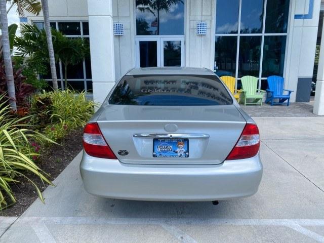 2003 Lunar Mist Metallic /Stone Toyota Camry AC AUTO LE LOW MILES 66,649 (4T1BE32K23U) with an 2.4L DOHC Vvti 16-Valve 4-Cyl Engine engine, Automatic transmission, located at 4701 North Dixie Hwy, Pompano Beach, FL, 33064, (954) 422-2889, 26.240938, -80.123474 - OUR WEBPAGE FLORIDACARS1.COM HAS OVER 100 PHOTOS AND FREE CARFAX LINK 2003 Toyota Camry LE Sedan 4 DR 2.4L I4 F DOHC 16V Gasoline 32 MPG Front Wheel Drive Features Air Conditioning AM/FM Stereo Automatic Transmission Cassette Player CD Audio Cloth Seats Cruise Control Power Locks Power Mirrors Power- Photo#99